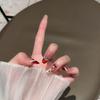 Christmas Red French Short Oval Nails with Bow & Snowflake Design