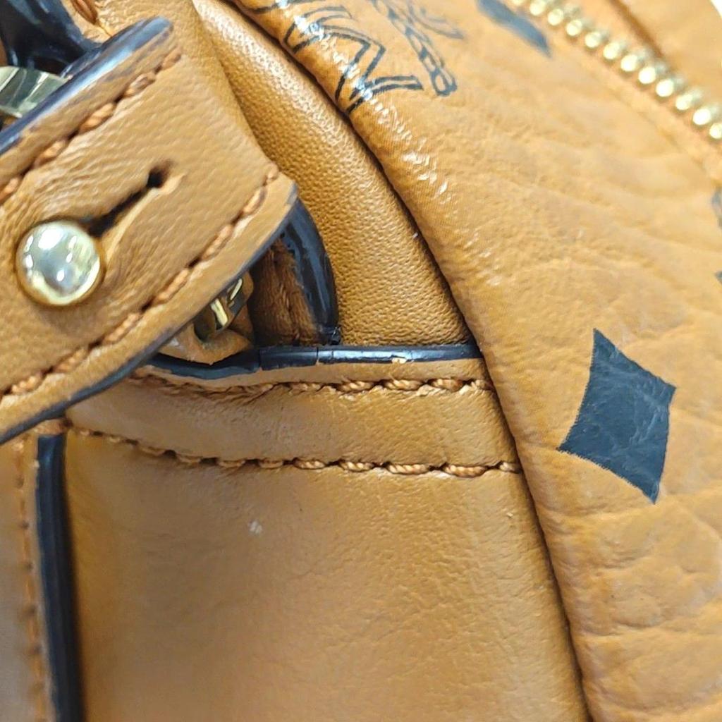 [Pre-Owned] Classic Studded Monogram Print Leather Mini Backpack - Good #A7KIIG