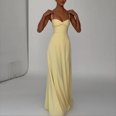 Nuevos modelos de primavera, ropa europea y americana para mujer, elegante y sexy, vestido de tirantes de color liso para banquete
