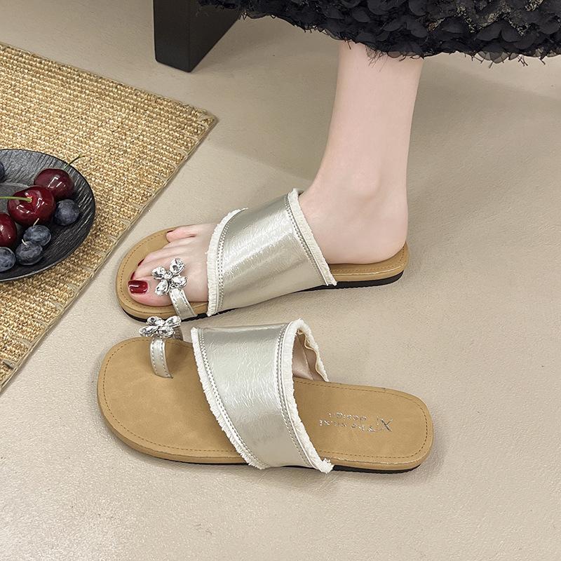 Mezzanine slippers women's summer wear 2025 new fairy style low heel with skirt flat bottom cover toe Roman cool slippers