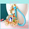 Elegant Cinderella Pumpkin Car Charm Keychain Accessory For Women With Metallic Finish And Colorful Ropes Ideal For Gifts And Special Occasions