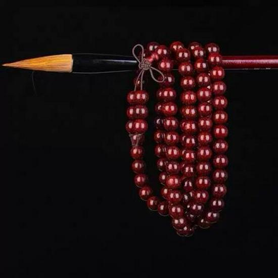 Herren Armband aus rotem Sandelholz mit goldenem Stern Agarholz Buddhistische Gebetsperlen