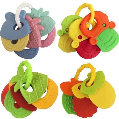 Bébé Style Fruit Hochet en Caoutchouc Souple Anneau de Dentition Jouet Nouveau-né Mâche Anneaux de Dentition en Silicone de Qualité Alimentaire Jouet d'Entraînement pour Lit d'Enfant Jouets à Mâcher Enfant