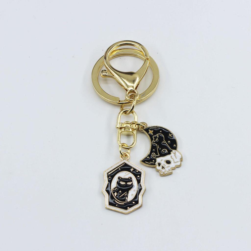 Halloween Cat & Bat Keychain with Wizard Hat, Drip Oil Skull, and Pumpkin Bag Pendant - Alloy Accessories.