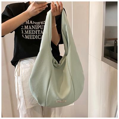 Nischen-Freizeit-Tasche Damen neue Frühjahrs-Umhängetasche Studenten-Pendler-Persönlichkeits-Trend-Tragetasche