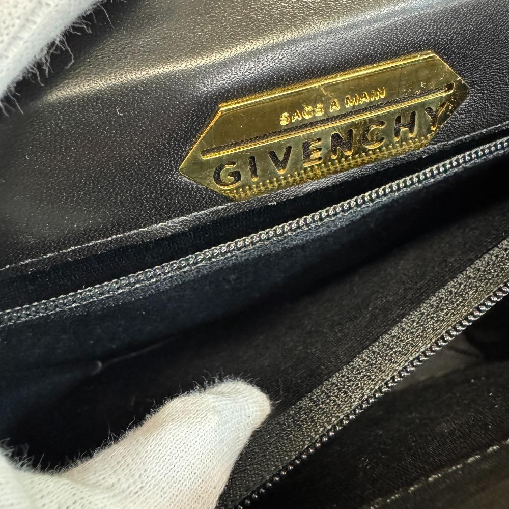 Givenchy Handbag with Logo Button and Top Handle Leather Handbag Black Leather Women Used