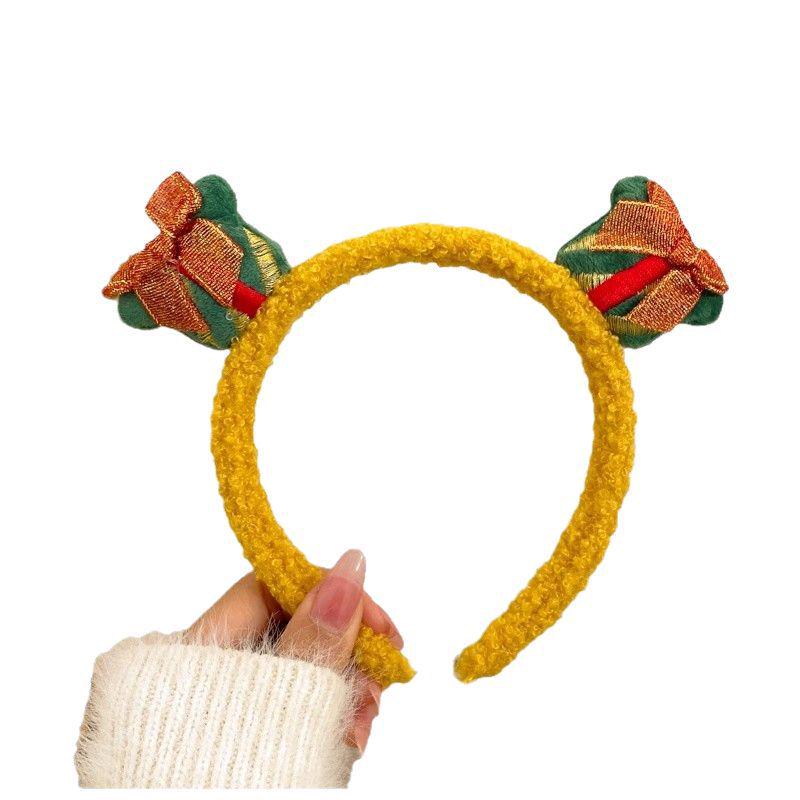Rentiergeweih Haarband: Niedliches Plüsch-Weihnachts-Stirnband für Damen, mit Lebkuchenmann, perfekt für Herbst- und Winterfestlichkeiten.