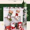 Three-Dimensional Cartoon Christmas Stockings with Decorative Pockets.