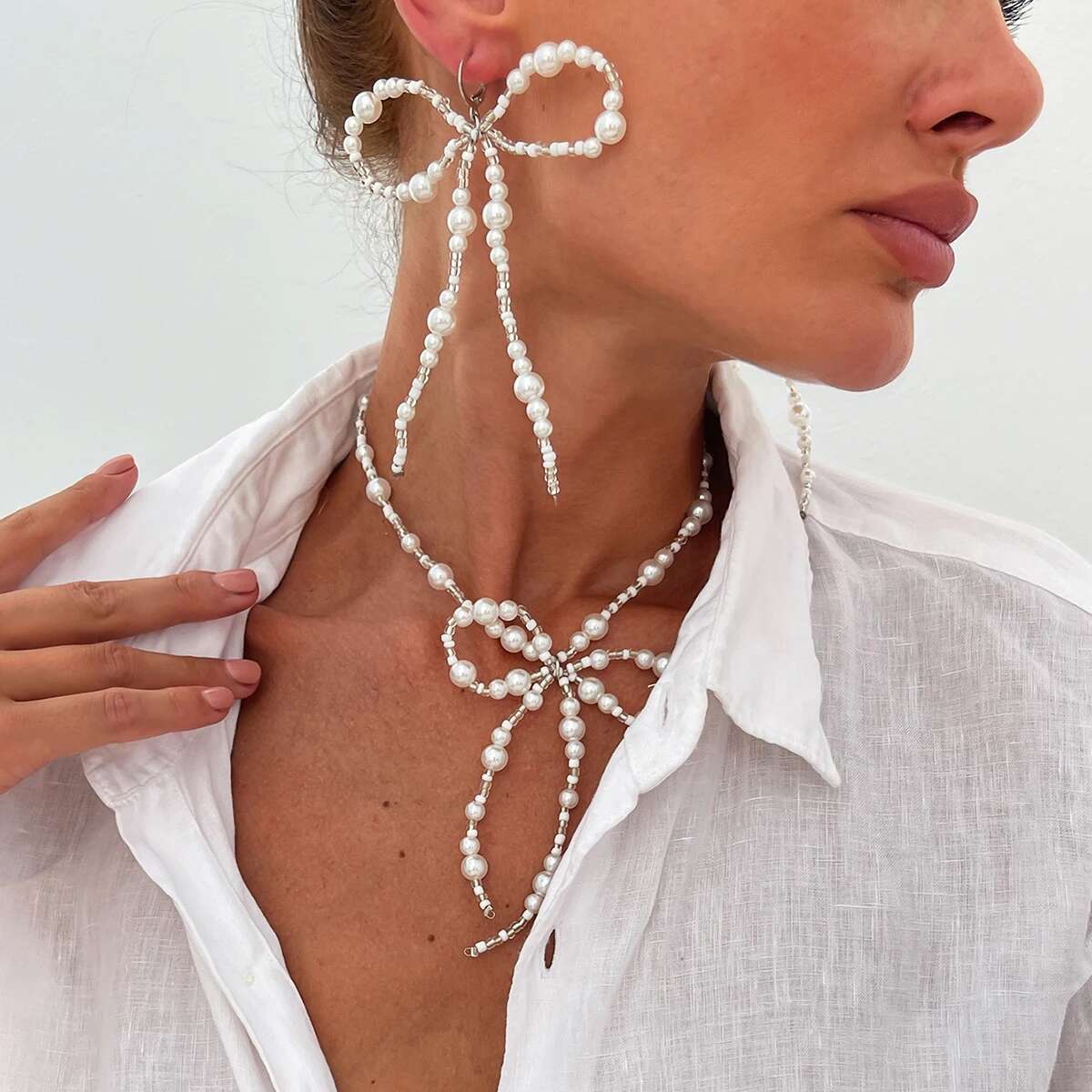 

Ingemark Aesthetic Elegant Imitation Pearl Bowknot Pendant Choker Necklace Drop Earrings for Women Trend Wedding Jewelry Set