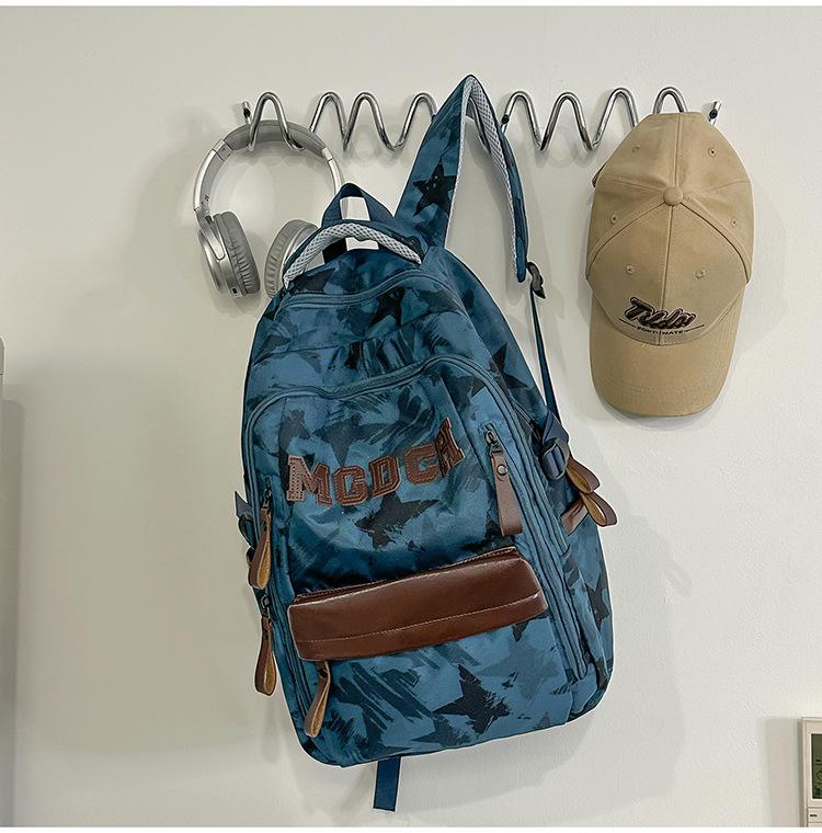 Schoolbag new street feel cool niche camouflage backpack junior high school students class holiday play to reduce the burden leisure bag