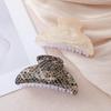 Iridescent Plaid Mother-of-Pearl Shark Clip: Durable, Elegant, Versatile Hair Accessory for Updos and Daily Use.