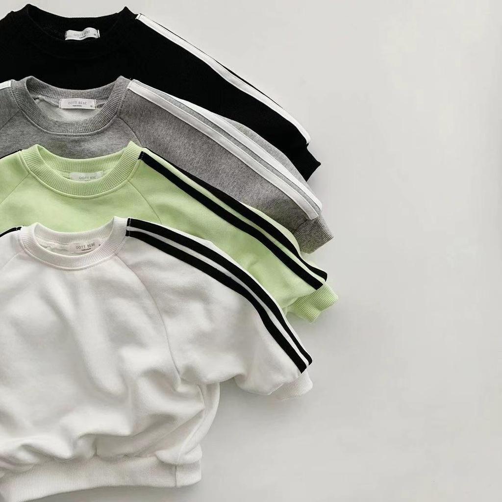Korean-Style Unisex Baby Sweatshirt and Pants Set - Solid Color with Webbing Stripe Patchwork for Autumn and Spring.