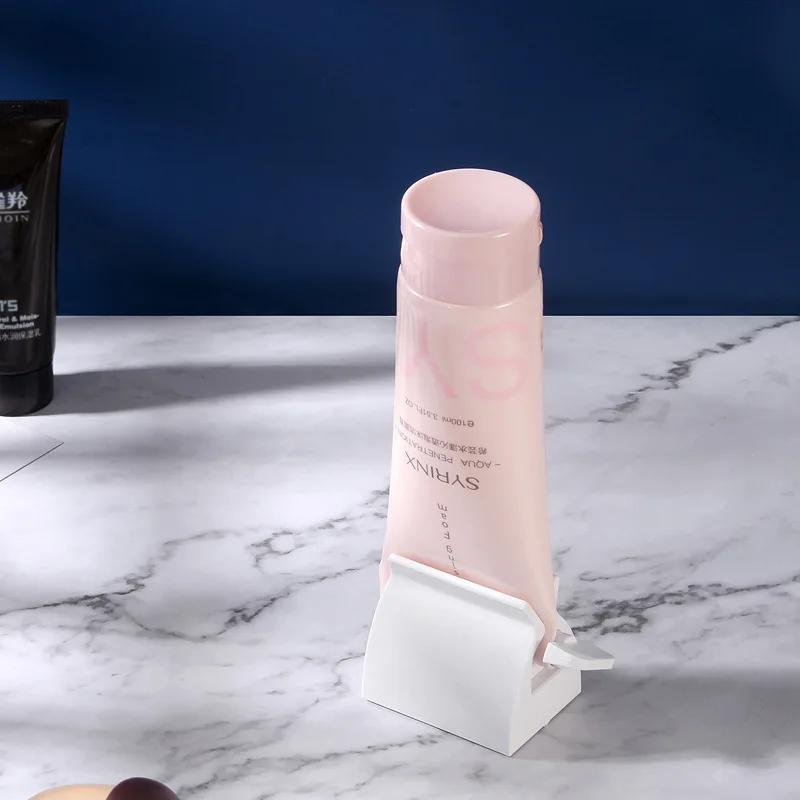 Badezimmerzubehör Zahnpasta-Quetschgerät Multifunktionaler Spender Gesichtsreiniger-Clips Manuelle Lazy Tube Werkzeuge Presse