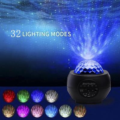 rotating night light projector with music