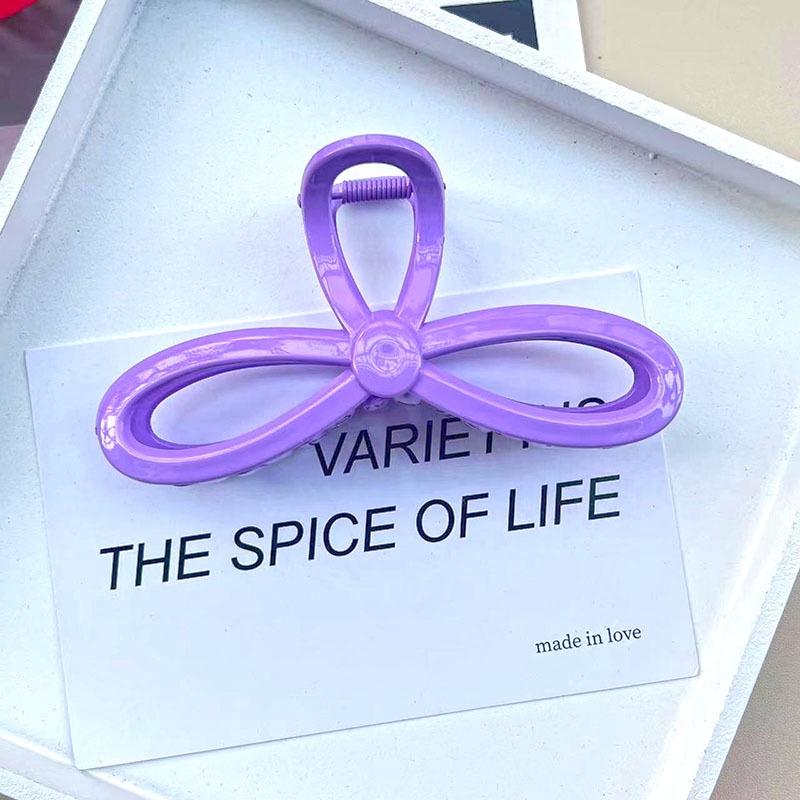 Barrette à cheveux style ins avec grande capacité et design élégant en forme de nœud