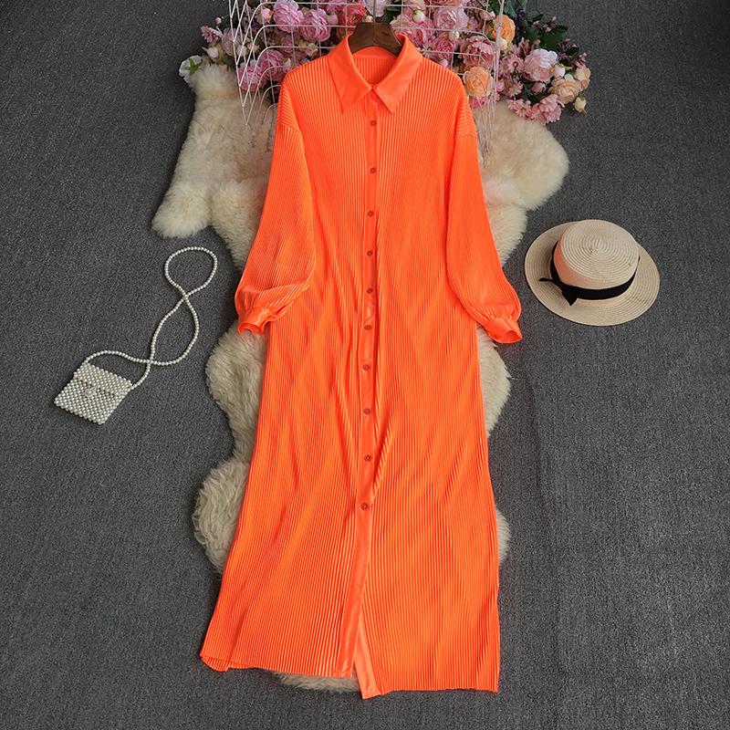 Letnia, jednokolorowa, luźna plisowana sukienka z klapami