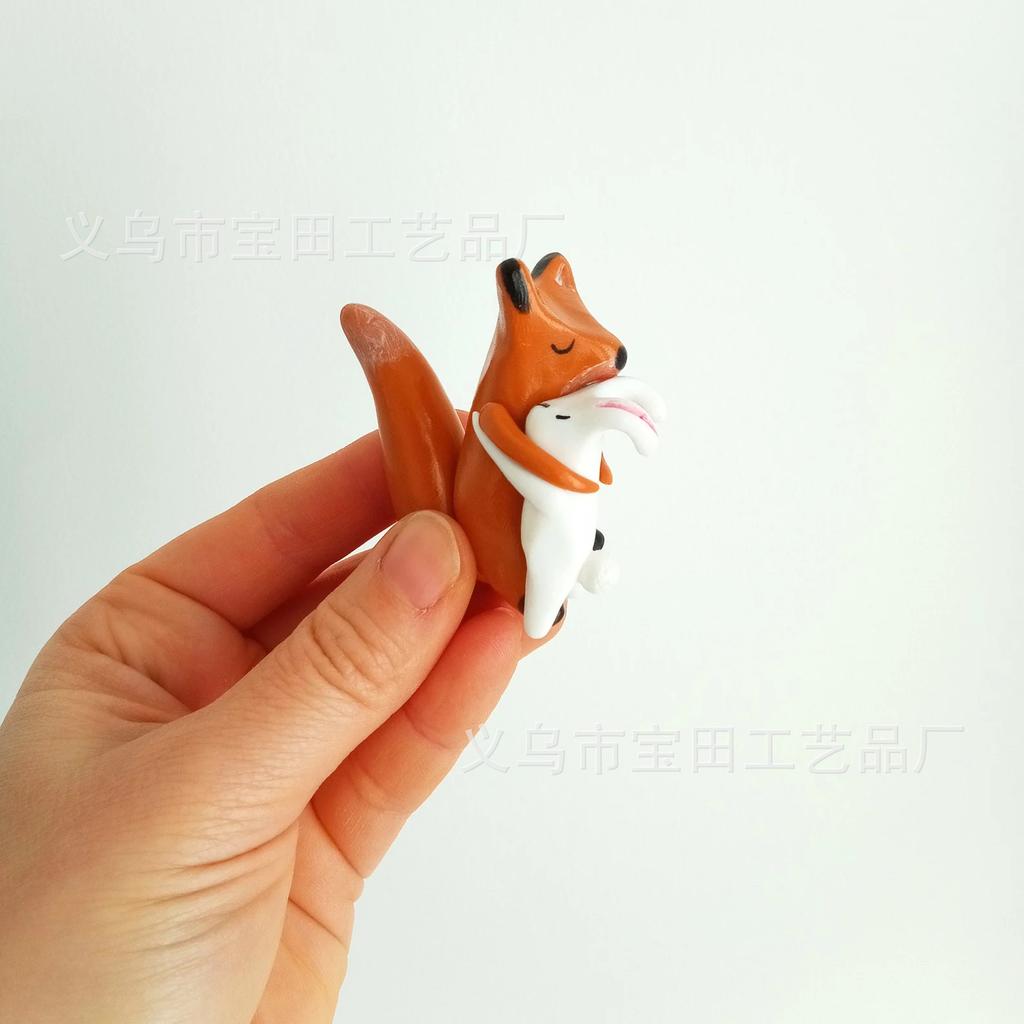A fox and bunny with love hug home cartoon mini resin figurine ornament