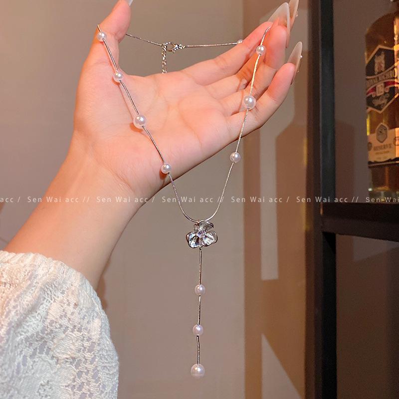 Long tassel flower pearl necklace women's light luxury design collarbone chain