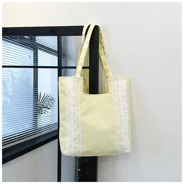 Koreansk stil enkel och stor kapacitet 2025 sommar ny axelväska utländsk stil mode toteväska för pendling spetsväska