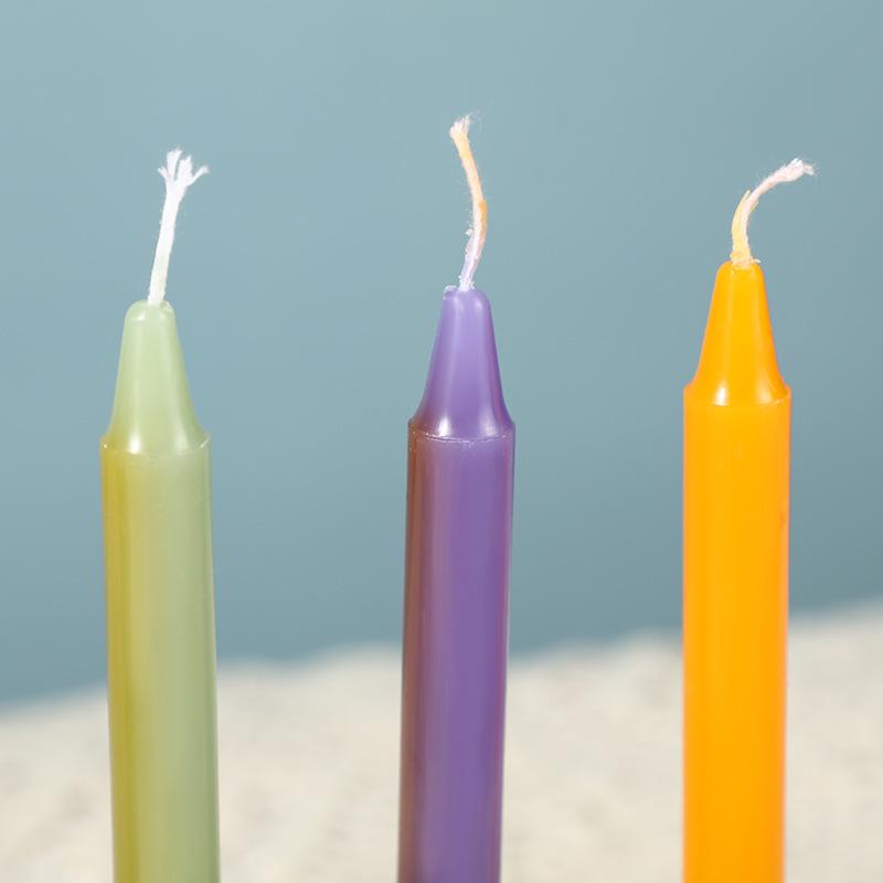 Trending 12-Piece Candle Set: Elegant Colored Taper Candles for Candlelight Dinners and Emergency Lighting.
