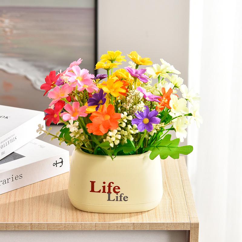 Living Room Decor: Artificial Sunflower and Green Plant Arrangements, Small Potted Plants, and Plastic Bouquets