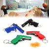 Breloczek Pistolet 100 Gumek Pistolet na Gumki Strzelanie Pistolet Stop Dziecko Impreza Plenerowa Metalowy Pistolet Prezent Zabawki dla Dzieci