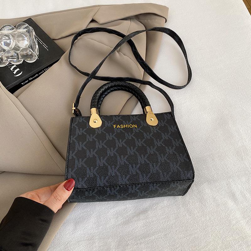 

Новая женская сумка через плечо, повседневная, простая, универсальная, модная, с высоким чувством почтальонской сумки через плечо