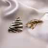 Elegant Clip-On Triangle Earrings for Non-Pierced Ears - Versatile, Light Luxury for Everyday Wear.