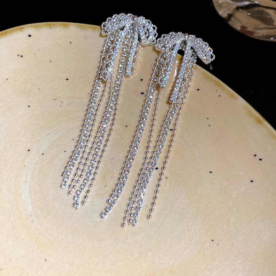 

Silver needle zircon bow fringed earrings retro simple fashion versatile earrings light luxury high-end temperament earrings