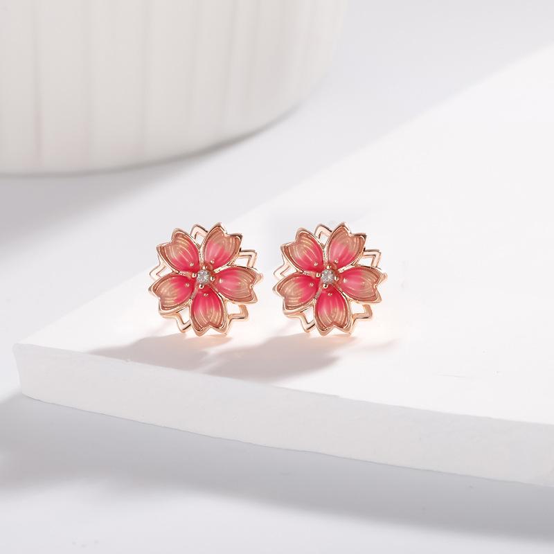 Korean and Japanese Version of Fashion Cherry Blossom Stud Earrings Women's Rotatable Epoxy Cold Wind Earrings Jewelry