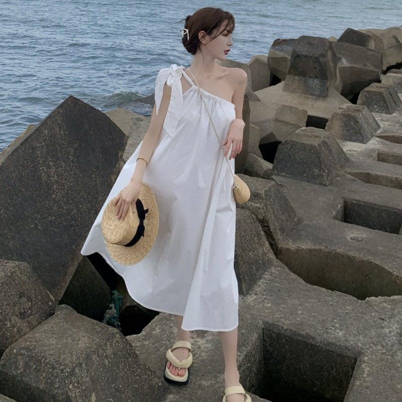 Sanya travel wear photo beach dress women small seaside vacation super fairy slanted shoulder suspender dress