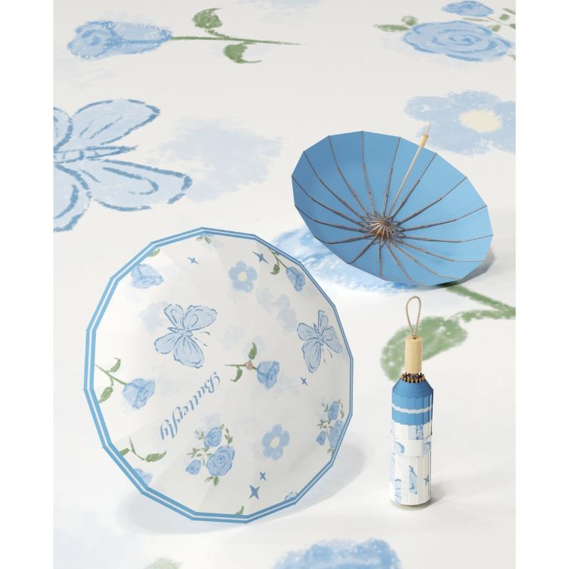 Hand-opened 16-bone color glue high-end gift umbrella three-fold retro wind-resistant reinforced umbrella for both weather and rain