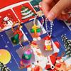 Vánoční hra s blind boxy Santa Clause - 40 otvorů, sváteční dárky a figurkové hračky pro děti