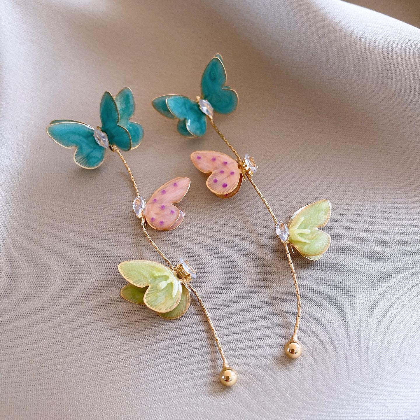 

Zircon dripping oil three-dimensional butterfly fringed earrings temperament stud earrings niche design earrings