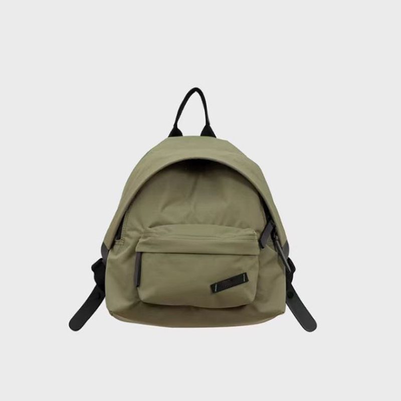 

Dong Jie Same Style Bag 2025 New Arrival Travel & Outdoor Backpack Waterproof Schoolbag Lightweight Backpack Nylon Bag for Women Licorice Medicine 11 inch [kids adult]]