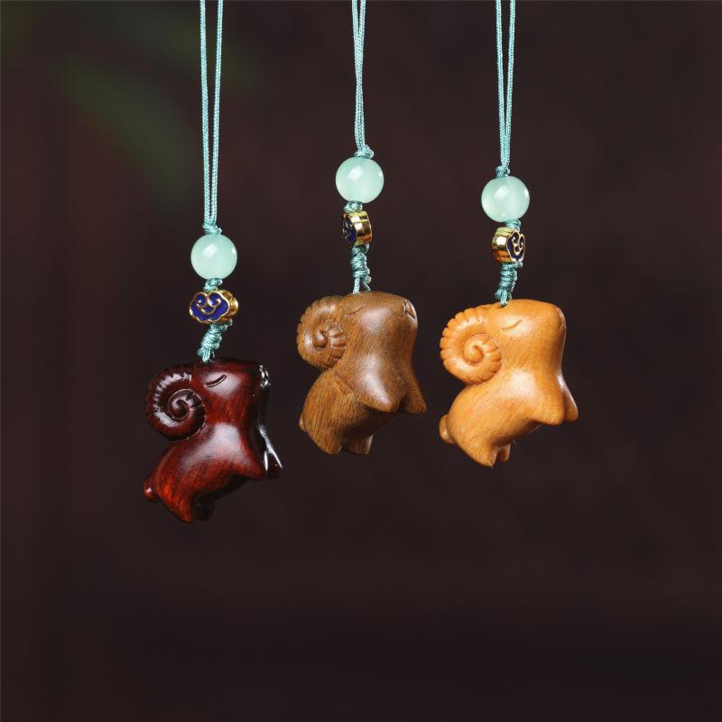 Red Sandalwood Sleepwalking Goat Zodiac Phone Pendant Keychain Ornament.