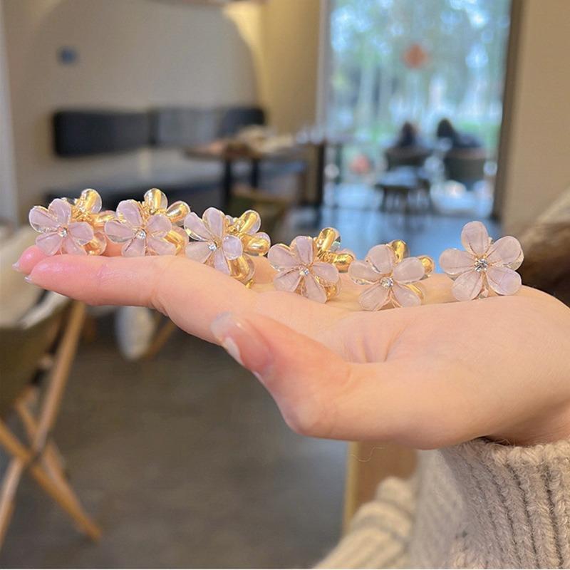 5/10PCS.Spring Camellia Hollow Small Claw Clips for Kids. Minimalist Floral Design, Durable Metal Texture, Secures Bangs Well.