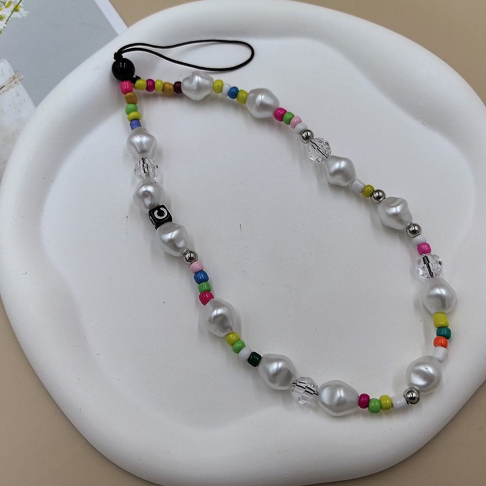 

Модный брелок для телефона из рисовых бусин с жемчугом и жемчугом от японских и корейских влиятельных лиц с узорами в виде бабочек и сердечек.