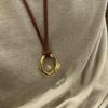 Women's Black Rope Pendant Necklace - Dong Jie Metal Circle, Long Sweater Chain, Vintage Luxury Style