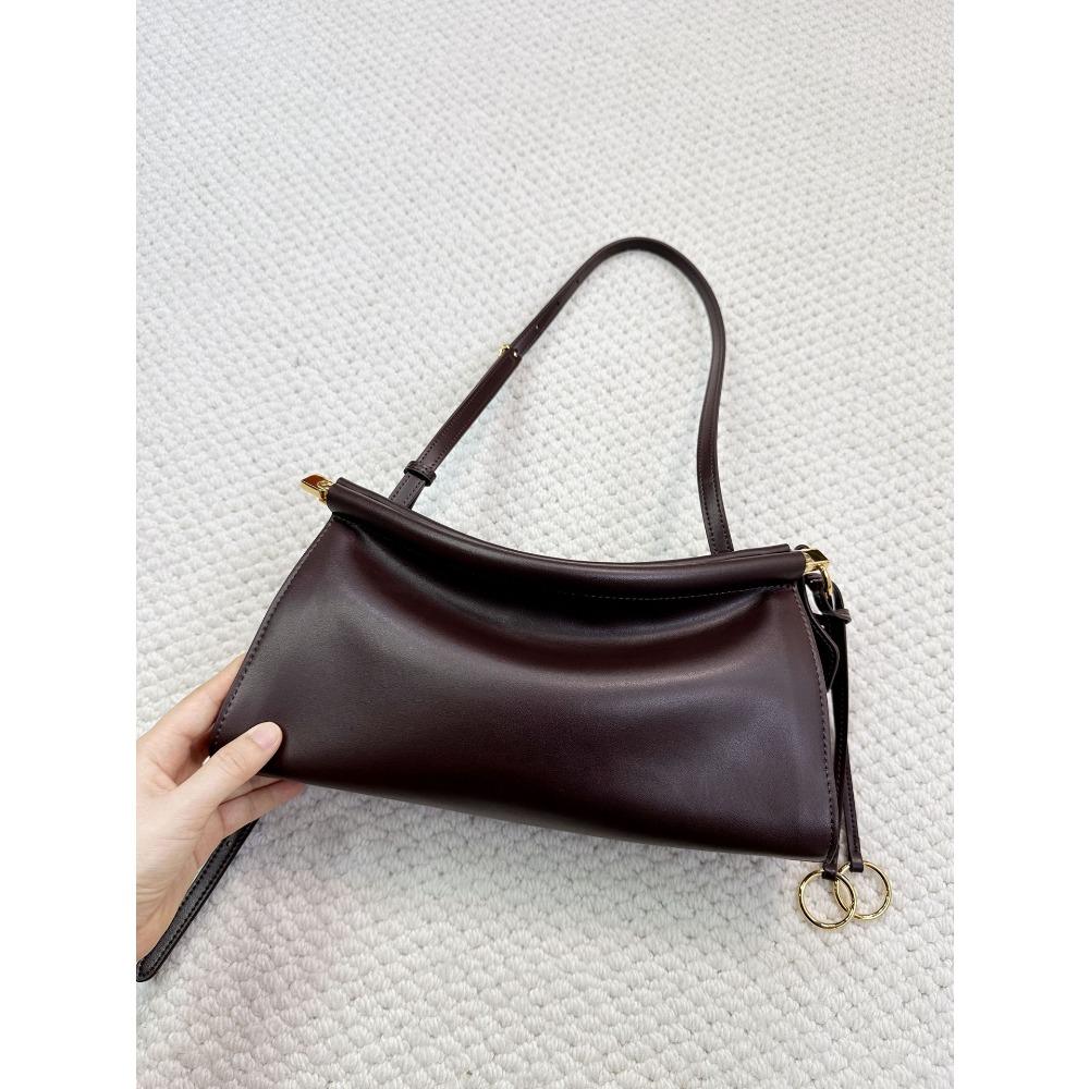 

2025 Европейская и американская новая кожаная ретро сумка-багет, сумка под мышкой, высококлассная изысканная сумка-клип через плечо на одном плече для通勤 30x7x16cm кофейный