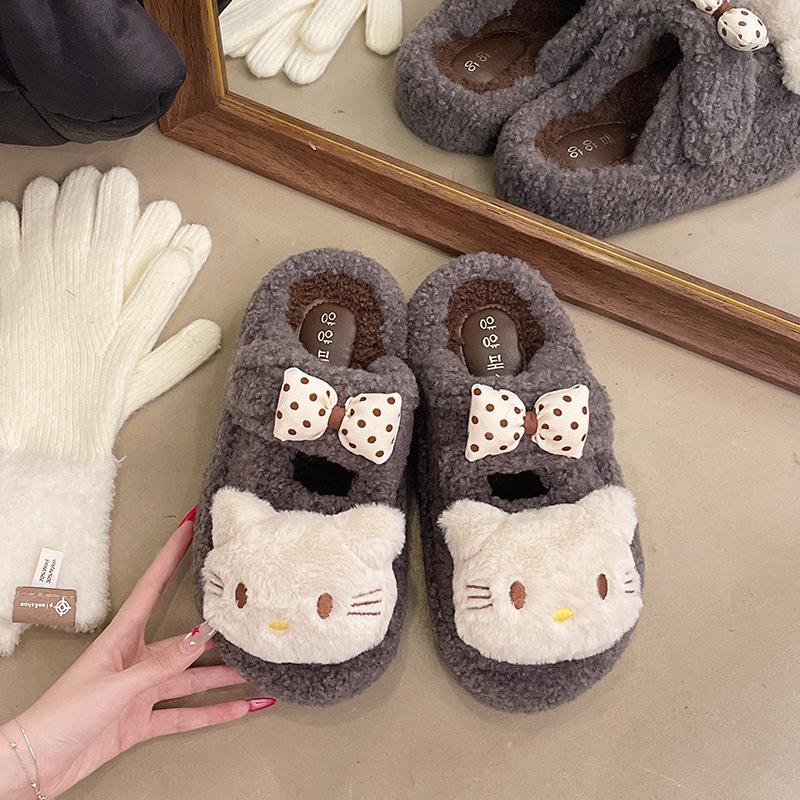 Niedliche Cartoon einfarbige Schleife mit Herzchen kt Katze flauschige Hausschuhe Damen 2025 Herbst und Winter neue Baumwoll-Hausschuhe für draußen