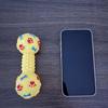 Interactive squeaky dumbbell dog toy, designed specifically for small dogs, made of durable rubber material