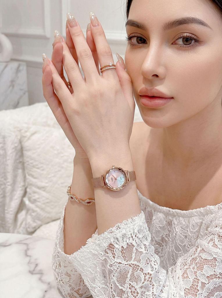Gedi Elegant Mesh Strap Women's Quartz Watch with Faceted Diamond Markers, Waterproof and Versatile for Everyday Wear.