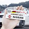 1 Pezzo Adesivi Metallici 3D Decalcomania per Carrozzeria e Bagagliaio Auto Per Nissan Sylphy N7 Teana Qashqai Note Navara Juke GTR 350z Patrol Leaf Tiida Kicks