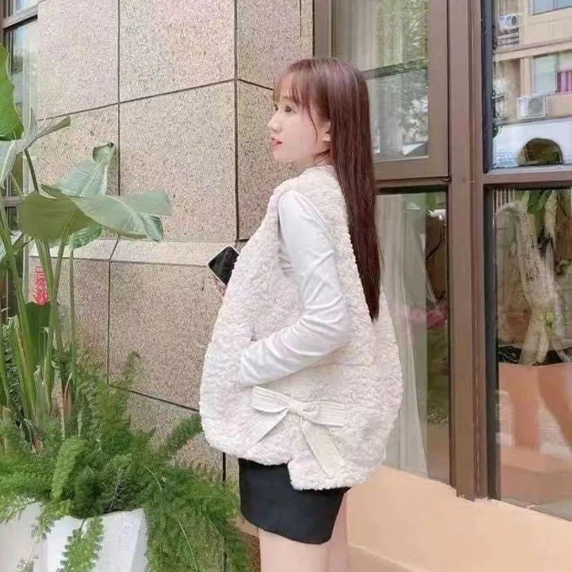 Xiaoxiangfeng Weste aus Kaninchenfellimitat für Damen im Frühjahr und Herbst, neuer Pelz, integrierte Weste aus Kaninchenfellimitat, kragenloser, lockerer Mantel