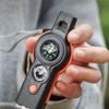 7-in-1 Multifunktionspfeife Outdoor-Kompass Thermometer LED-Licht Überlebens-Taschenlampe Rückspiegel Lupe