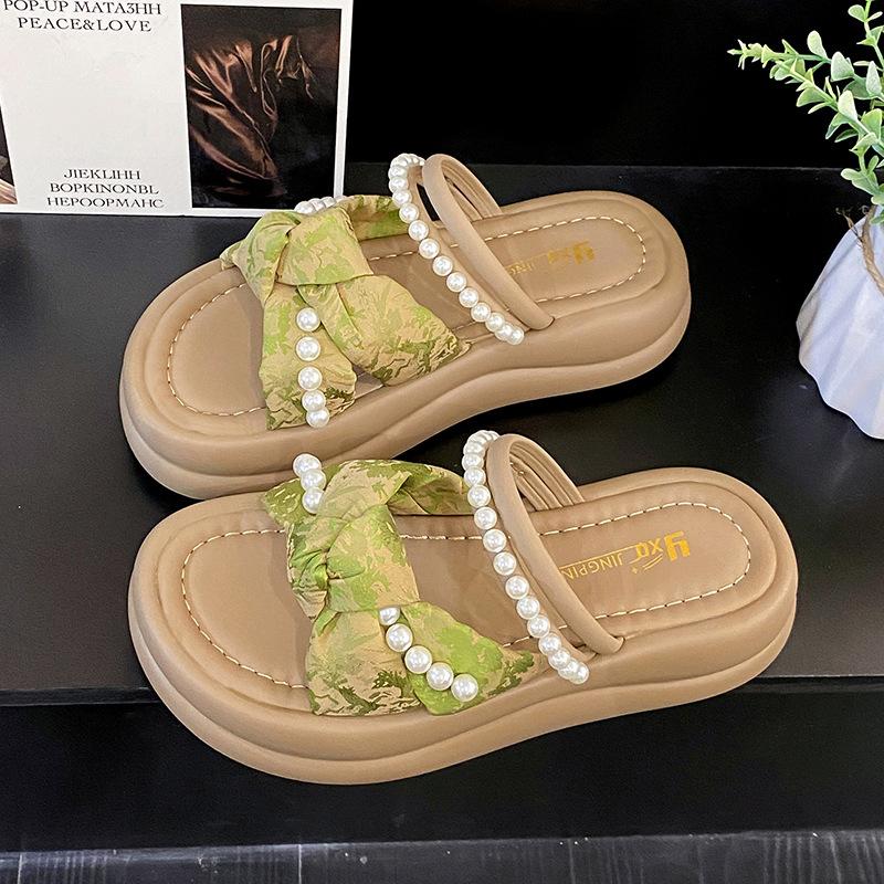 thick-soled pearl slippers for women to wear in the summer of 2025, new one-character cross-strap flat-bottomed cool slippers for women