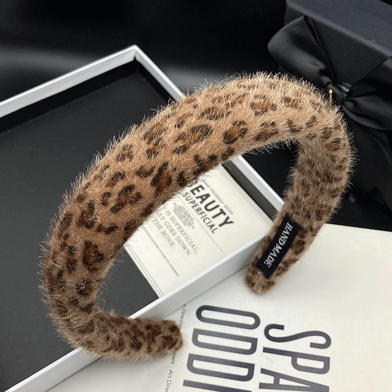 

Шикарная заколка-ободок для волос с леопардовым принтом для женщин – Элегантный дизайн с высоким затылком, Универсальная для шопинга, укладки волос и умывания лица.