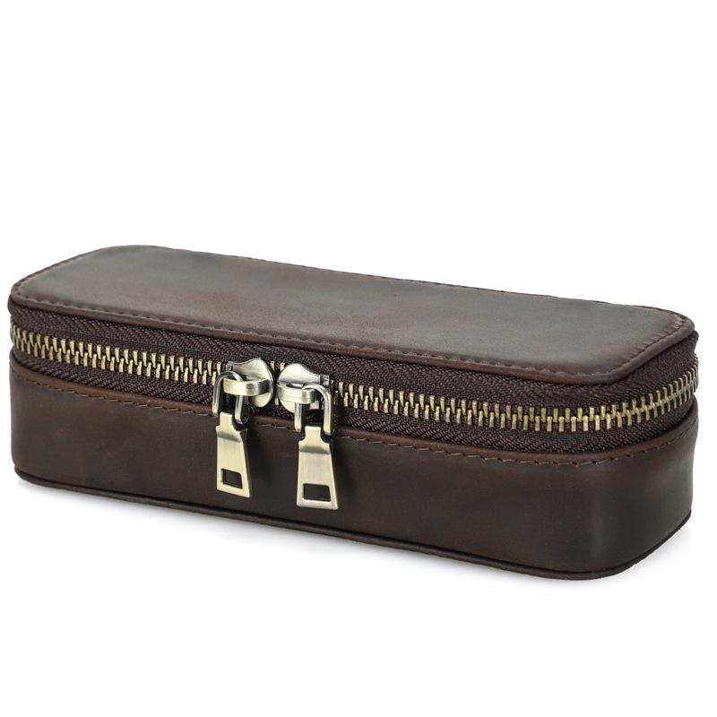 

Retro Crazy Horse Cowhide Jewelry Box: Multi-Compartment Genuine Leather Storage with Portable Ring Holder.