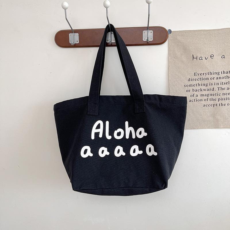 

Personalized new product niche design leisure student 2025 large capacity tote bag lazy wind commuter shoulder women s bag